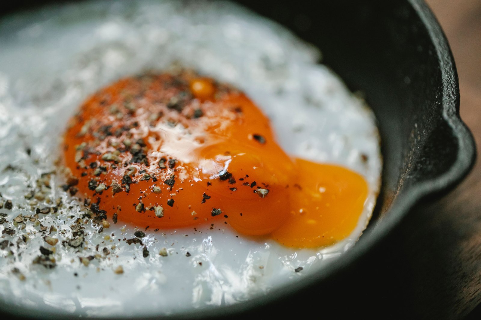 Photo of an egg being cooked