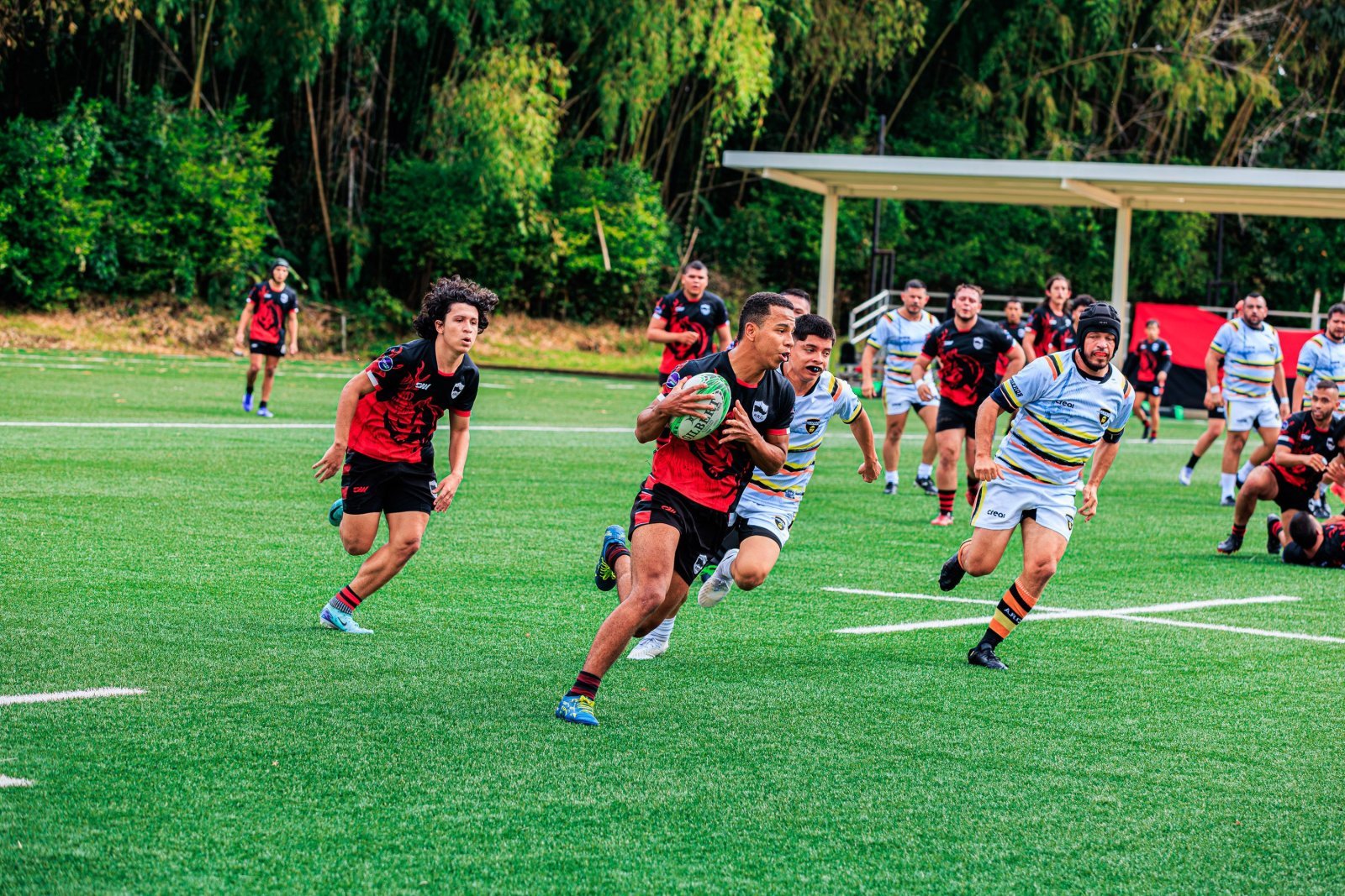 Photo of a group of people playing sports outdoors