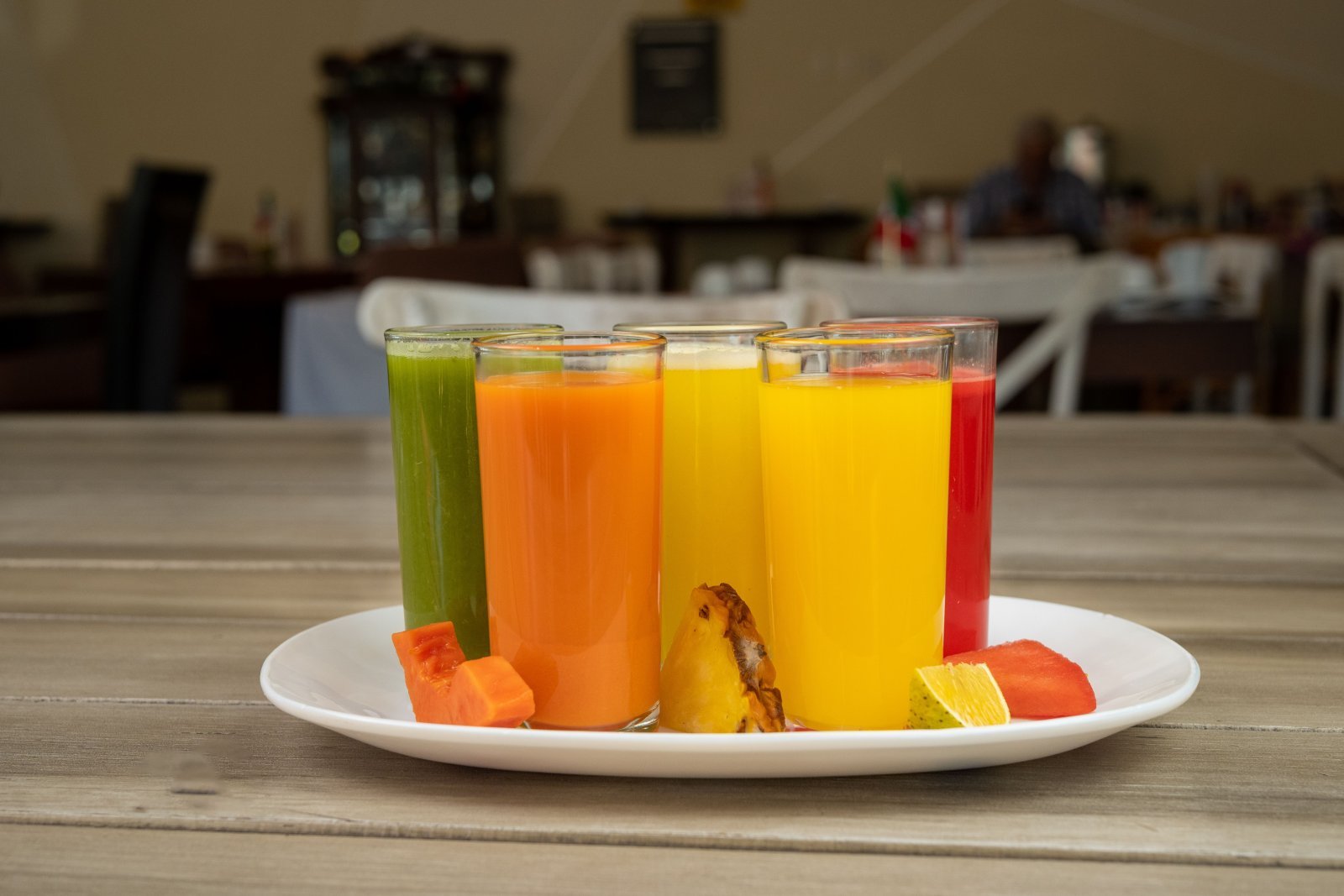 Multiple glasses of freshly squeezed fruit juice