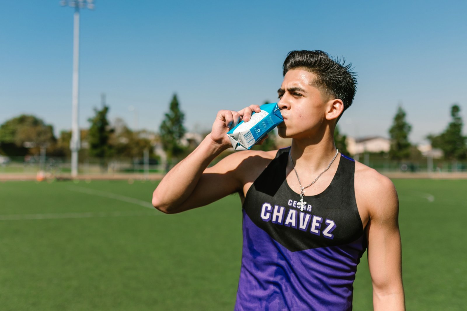 Photo of an athlete taking a break to take a drink