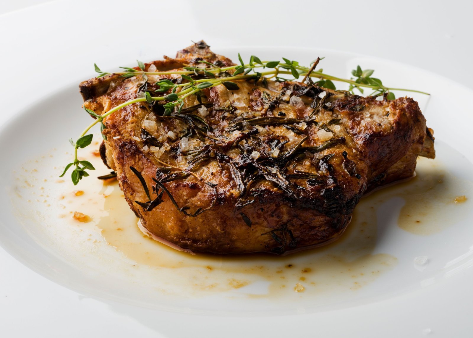 Photo of cooked grass fed steak on a plate